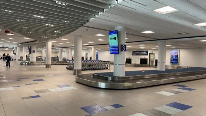 Halifax Stanfield Airport baggage claim — collect all checked luggage before heading to the Ground Transportation Inspector